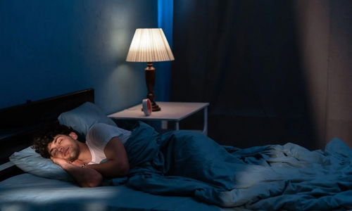 Person Sleeping With The Lamp On